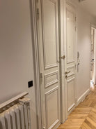 Porte blindée moulurée installée à Paris 17 avenue des ternes dans un immeuble ancien